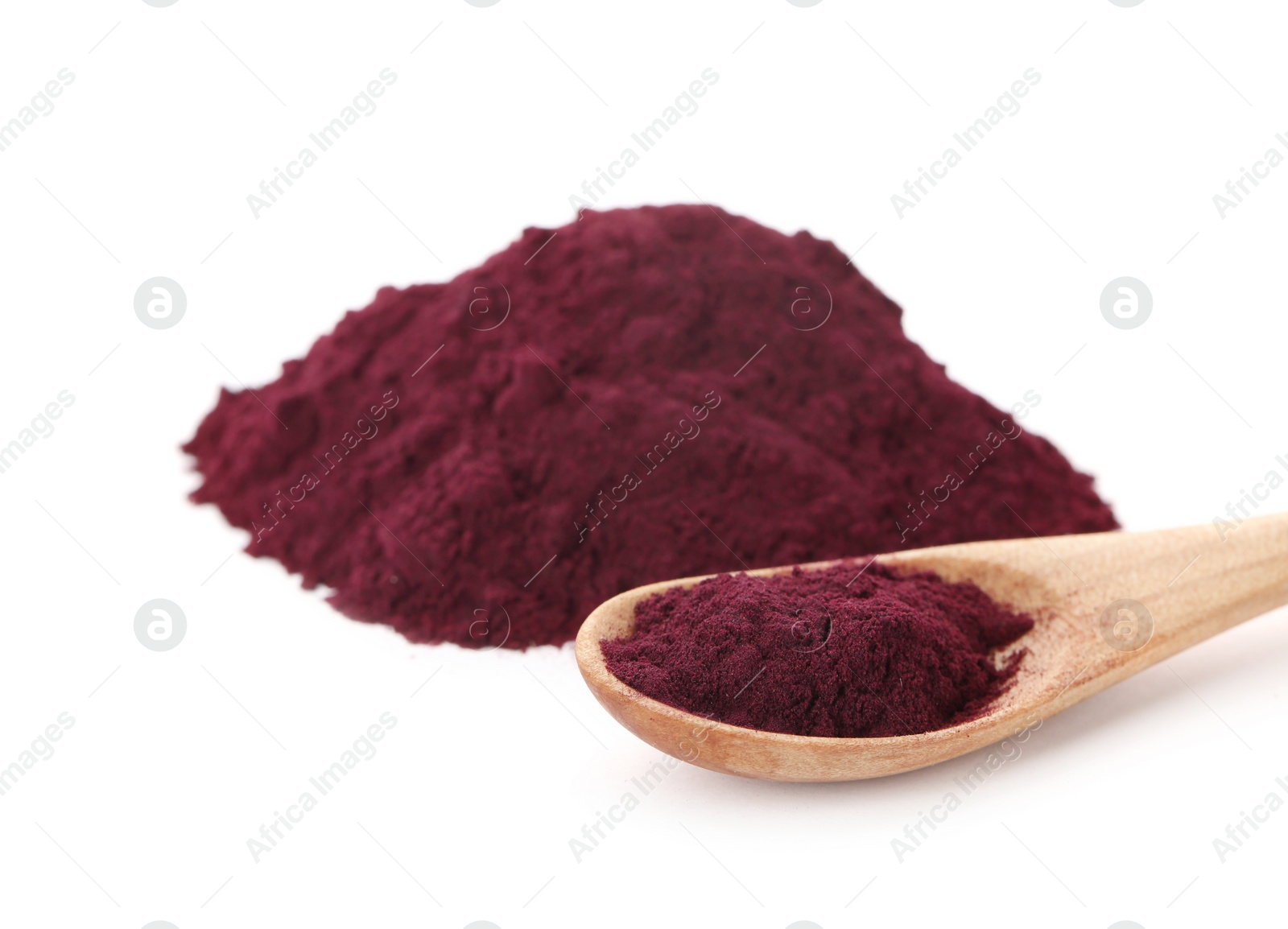 Photo of Wooden spoon and acai powder on white background