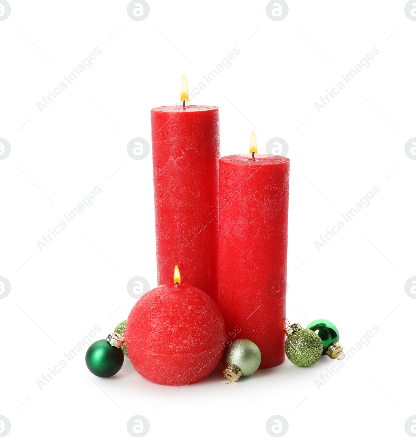 Photo of Beautiful burning candles with Christmas decor on white background