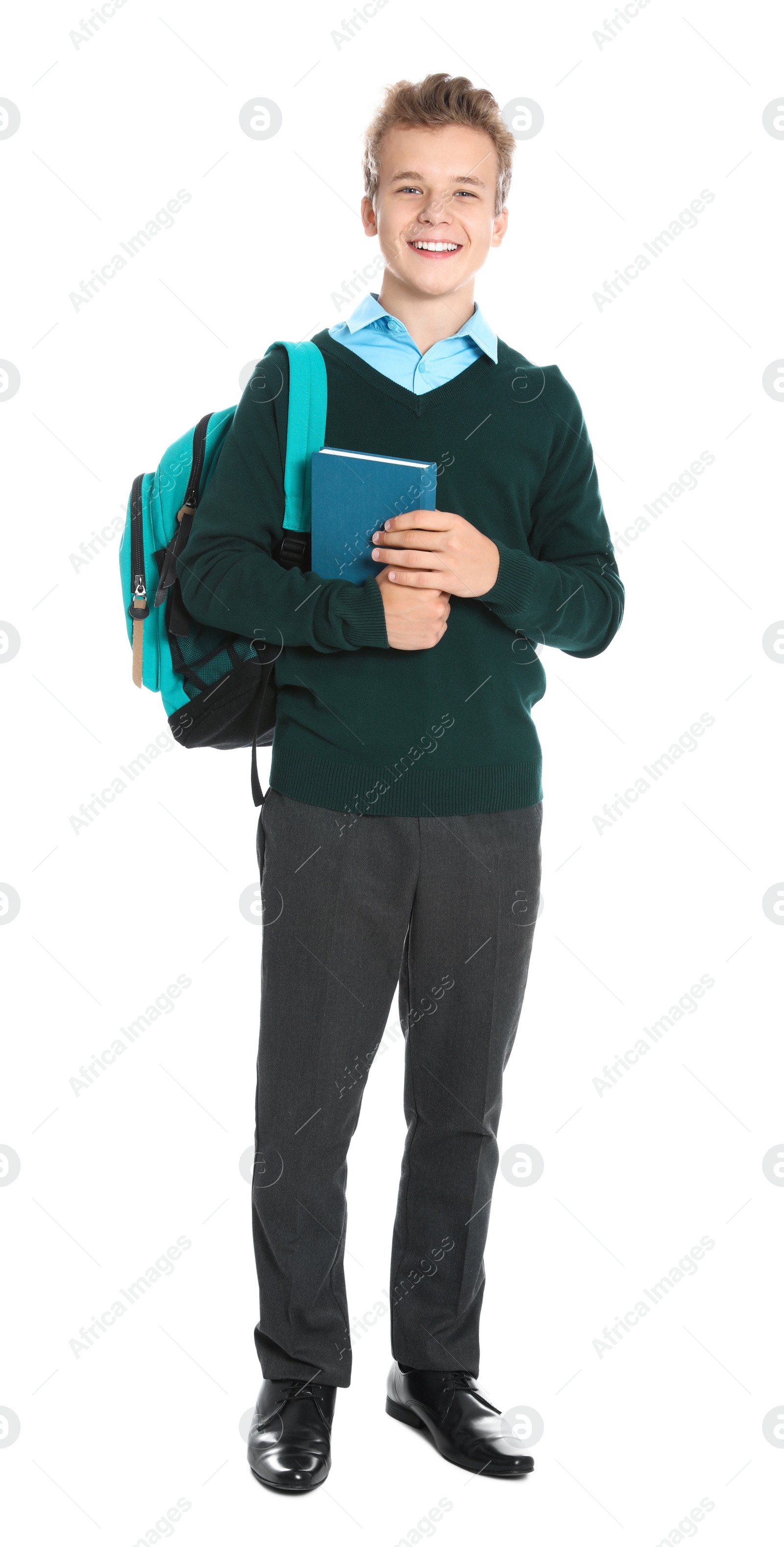 Photo of Happy boy in school uniform on white background