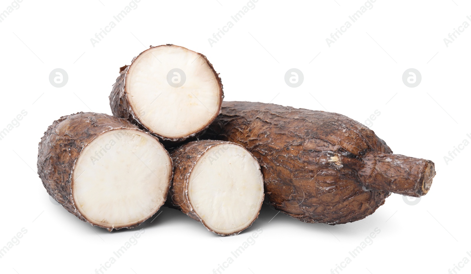 Photo of Whole and cut cassava roots isolated on white