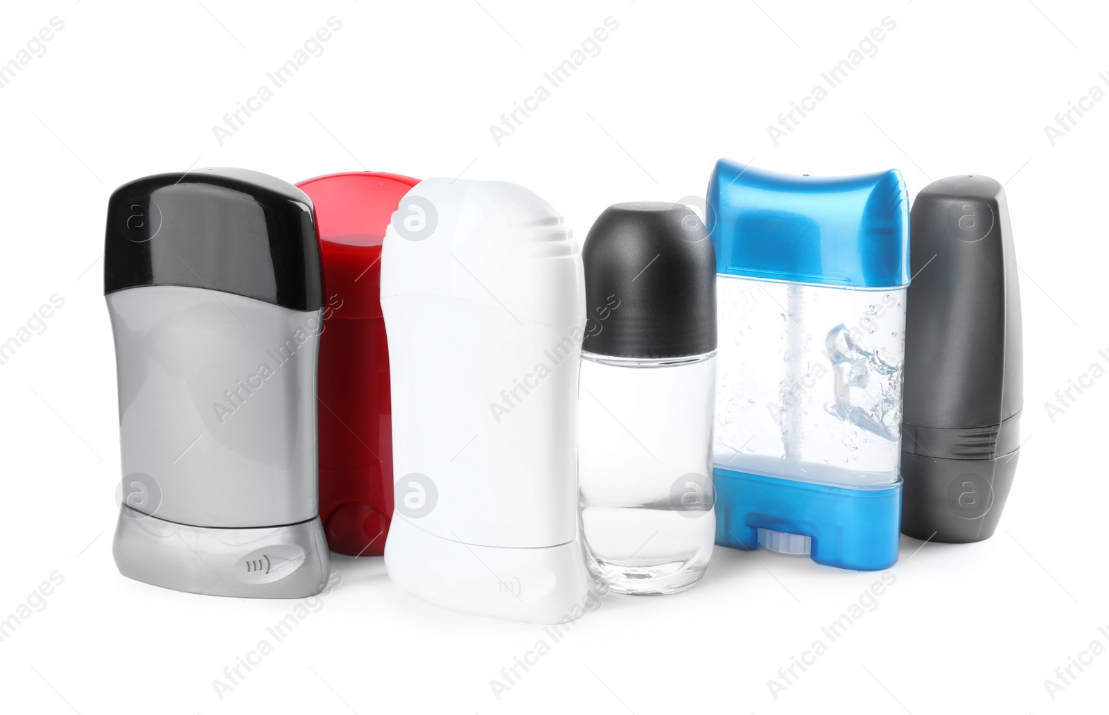 Photo of Different natural male deodorants on white background. Skin care