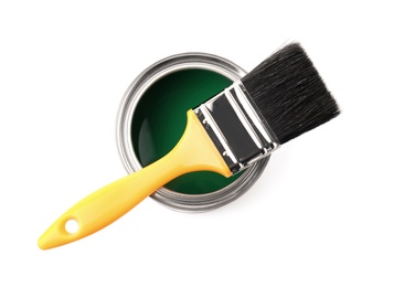 Photo of Paint can with brush on white background, top view