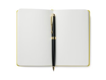 Photo of Open notebook with blank pages and pen isolated on white, top view