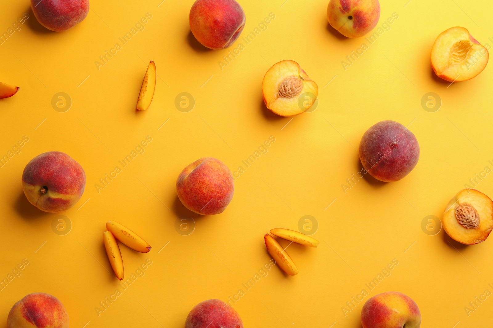 Photo of Flat lay composition with fresh peaches on yellow background