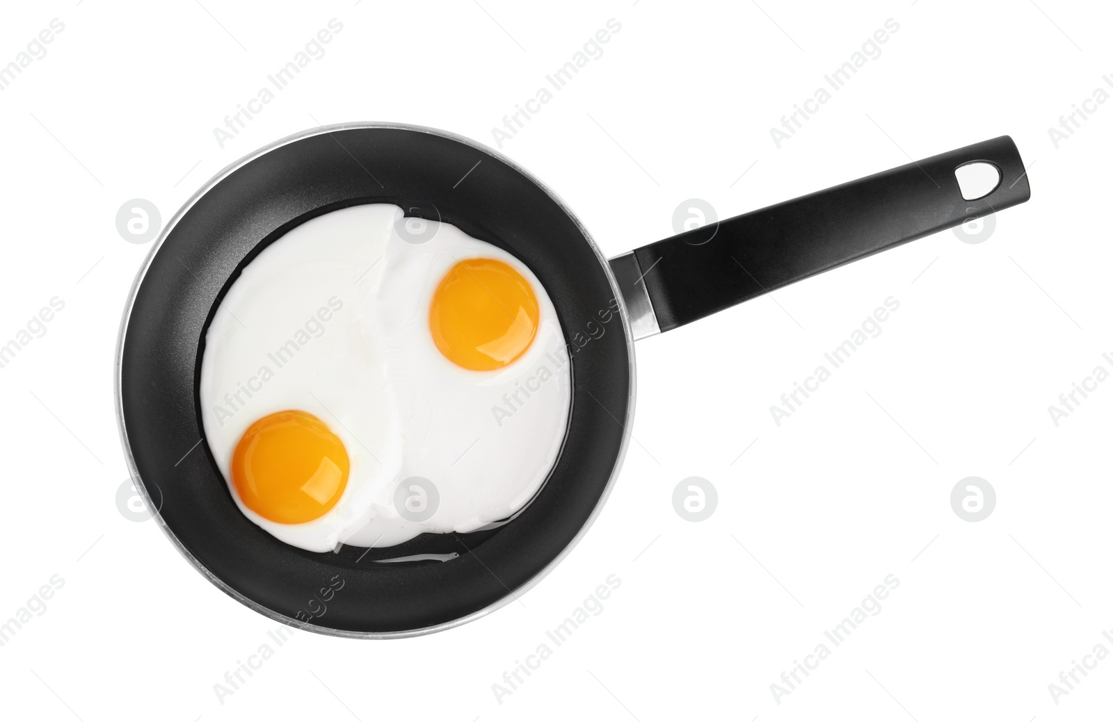 Photo of Tasty cooked chicken eggs in frying pan isolated on white, top view