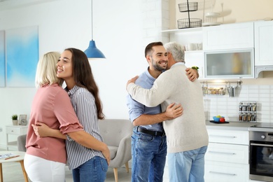 Photo of Happy family at home. Reunion of generations