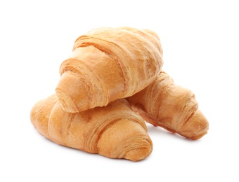 Tasty croissants on white background