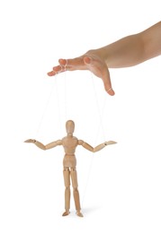 Photo of Woman pulling strings of puppet on white background, closeup