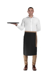 Photo of Full length portrait of happy young waiter with tray on white background