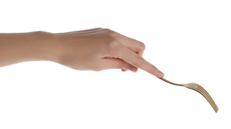 Woman with shiny golden fork on white background, closeup