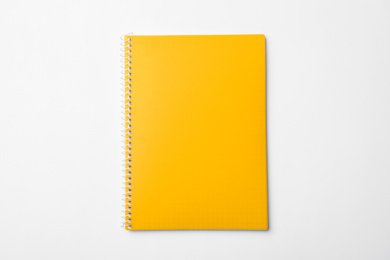 Stylish yellow notebook isolated on white, top view