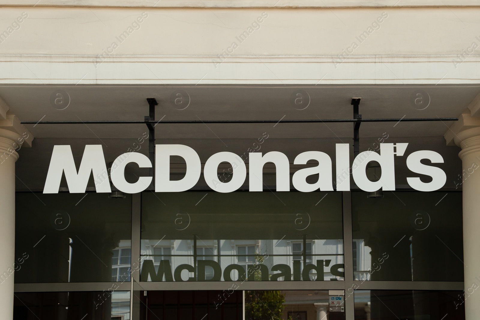 Photo of WARSAW, POLAND - JULY 19, 2022: Signboard with McDonald's Restaurant logo outdoors