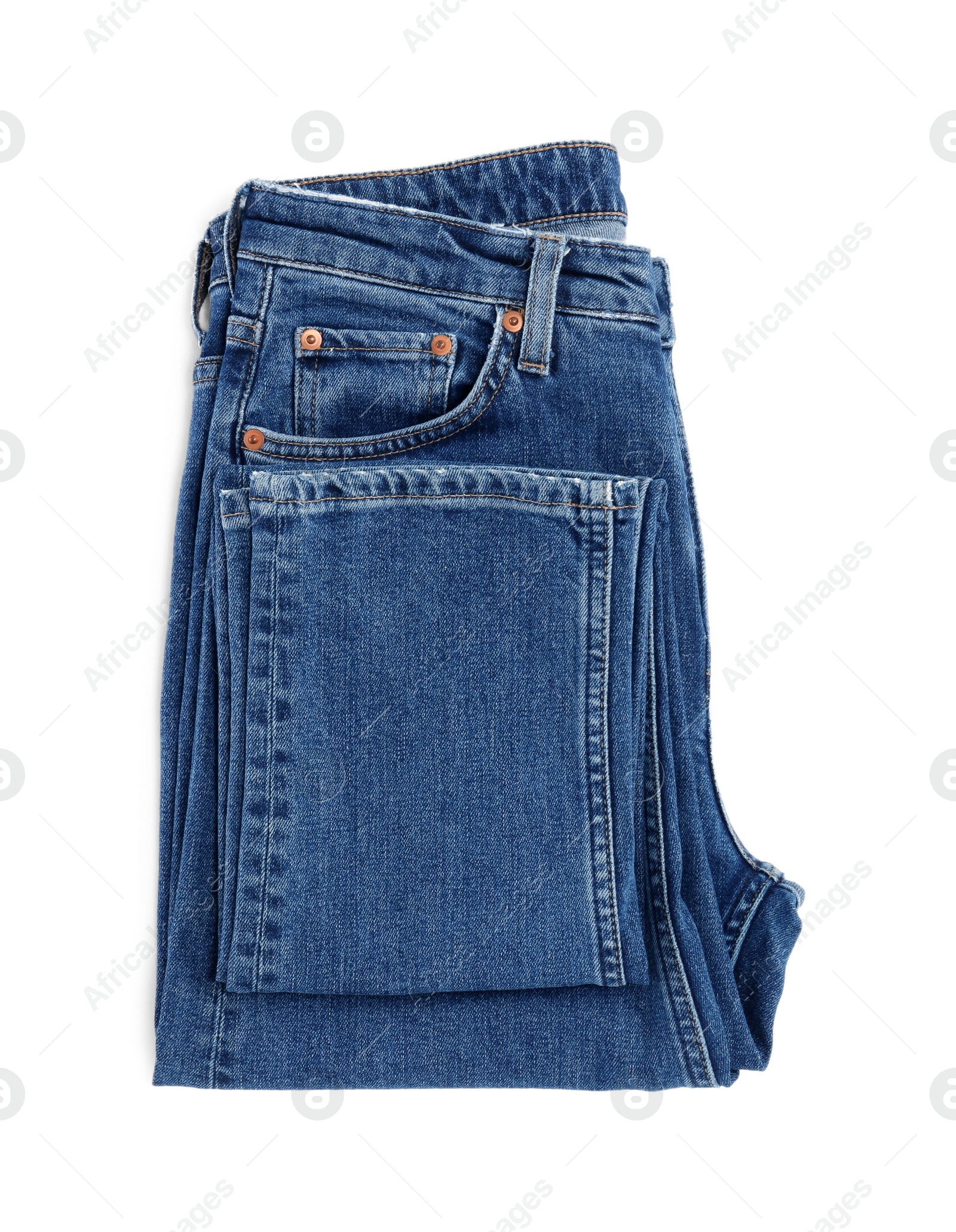 Photo of Dark blue jeans isolated on white, top view. Stylish clothes