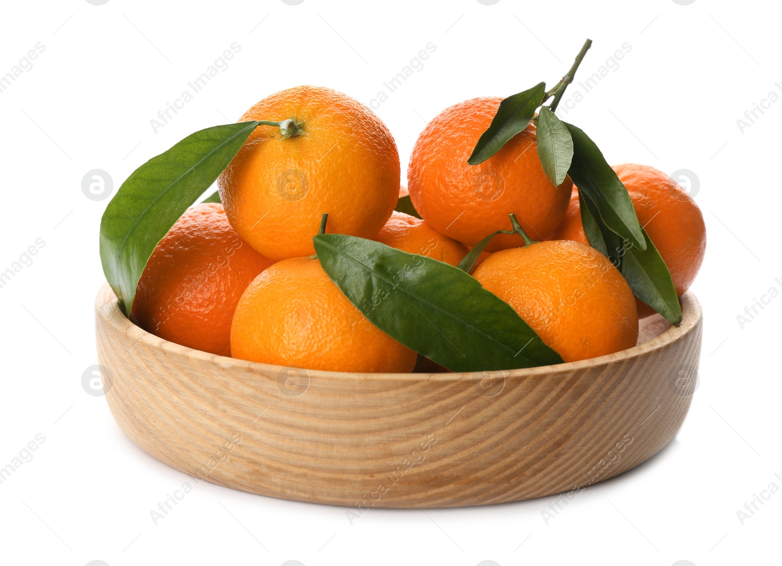 Photo of Fresh tangerines with green leaves in wooden bowl on white background