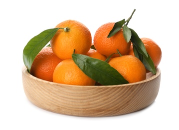 Fresh tangerines with green leaves in wooden bowl on white background