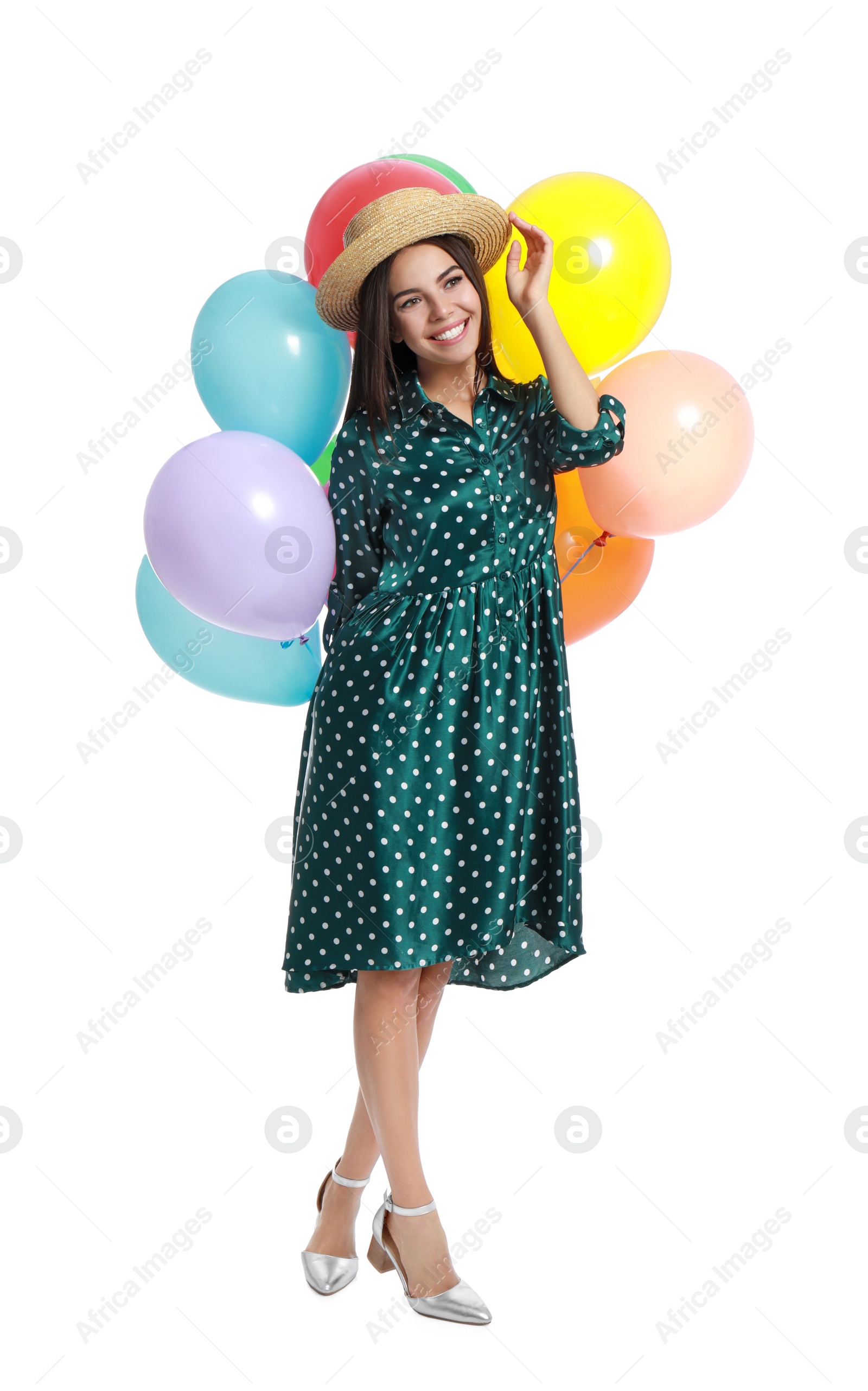 Photo of Young woman holding bunch of colorful balloons on white background