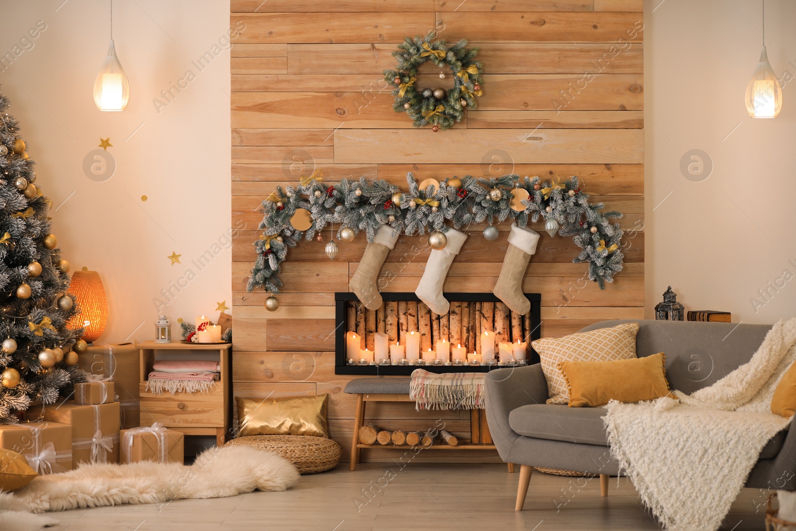 Photo of Stylish room interior with beautiful Christmas tree and decorative fireplace