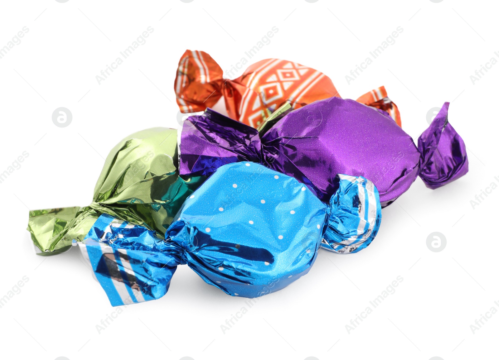 Photo of Sweet candies in colorful wrappers on white background