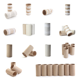 Image of Set with empty paper toilet rolls on white background