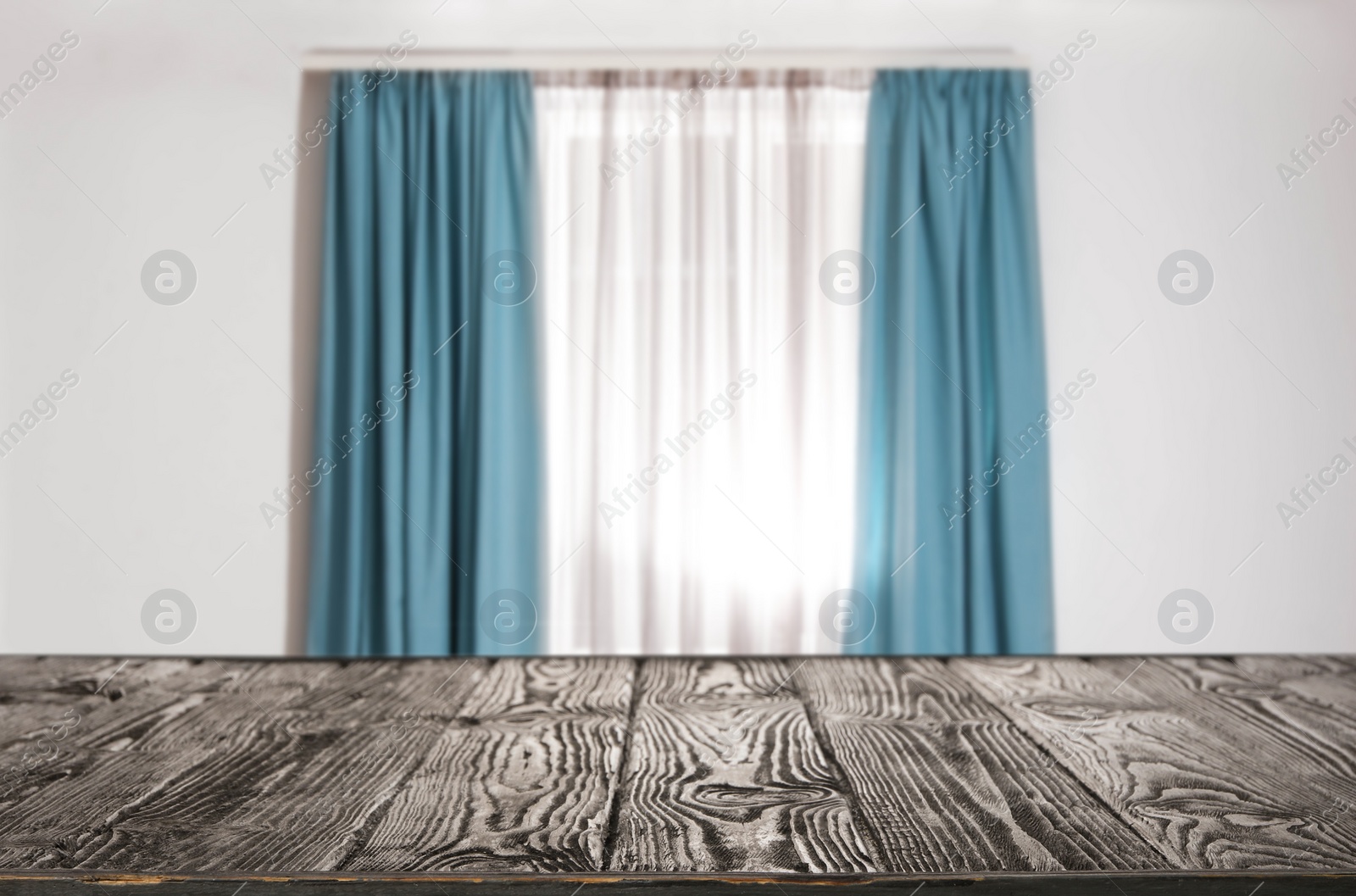 Image of Empty wooden table in room. Space for design