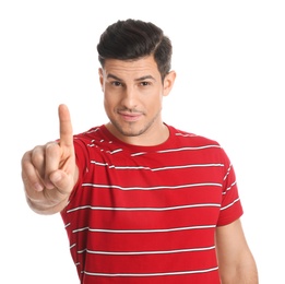 Photo of Man showing number one with his hand on white background