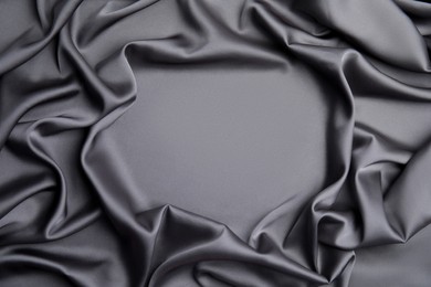 Texture of delicate black silk as background, top view