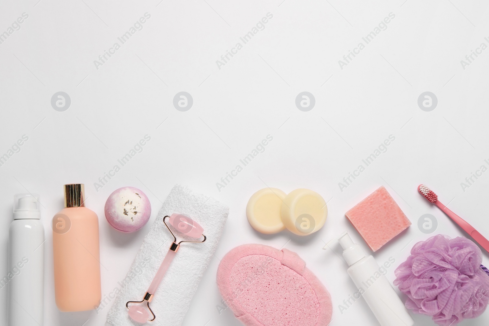 Photo of Bath accessories. Different personal care products on white background, flat lay with space for text