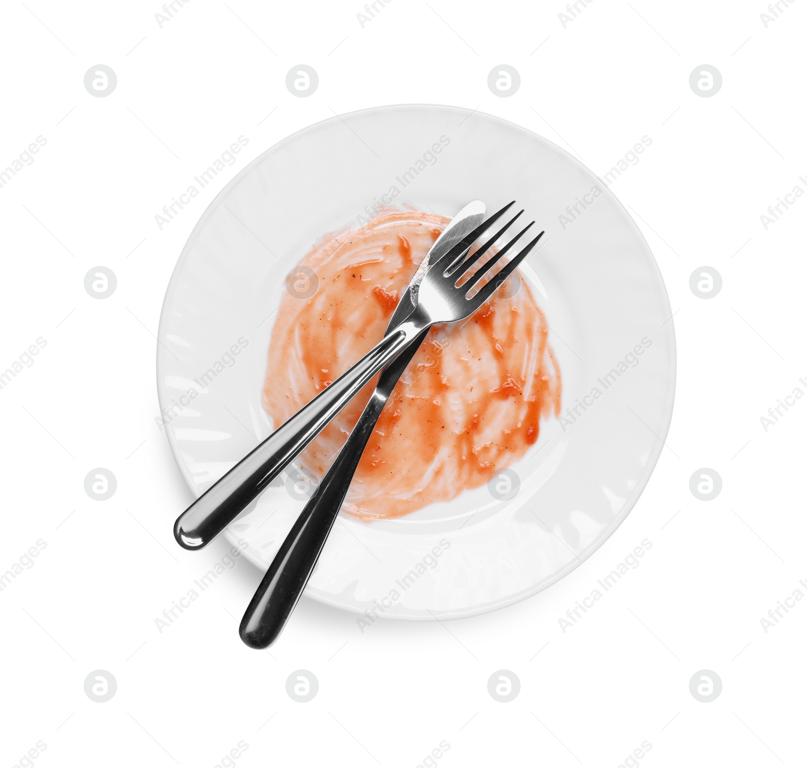 Photo of Dirty plate and cutlery on white background, top view