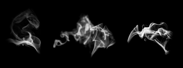 Collection of white smoke on black background