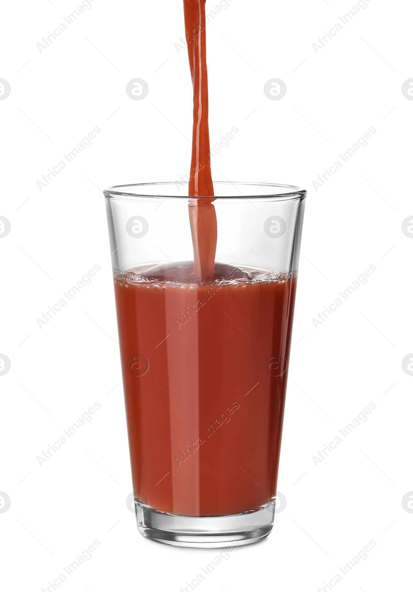 Photo of Pouring fresh juice into glass on white background