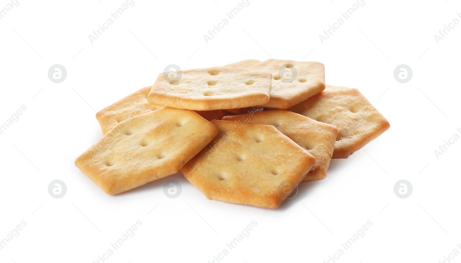 Photo of Crispy crackers isolated on white. Delicious snack