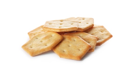 Photo of Crispy crackers isolated on white. Delicious snack