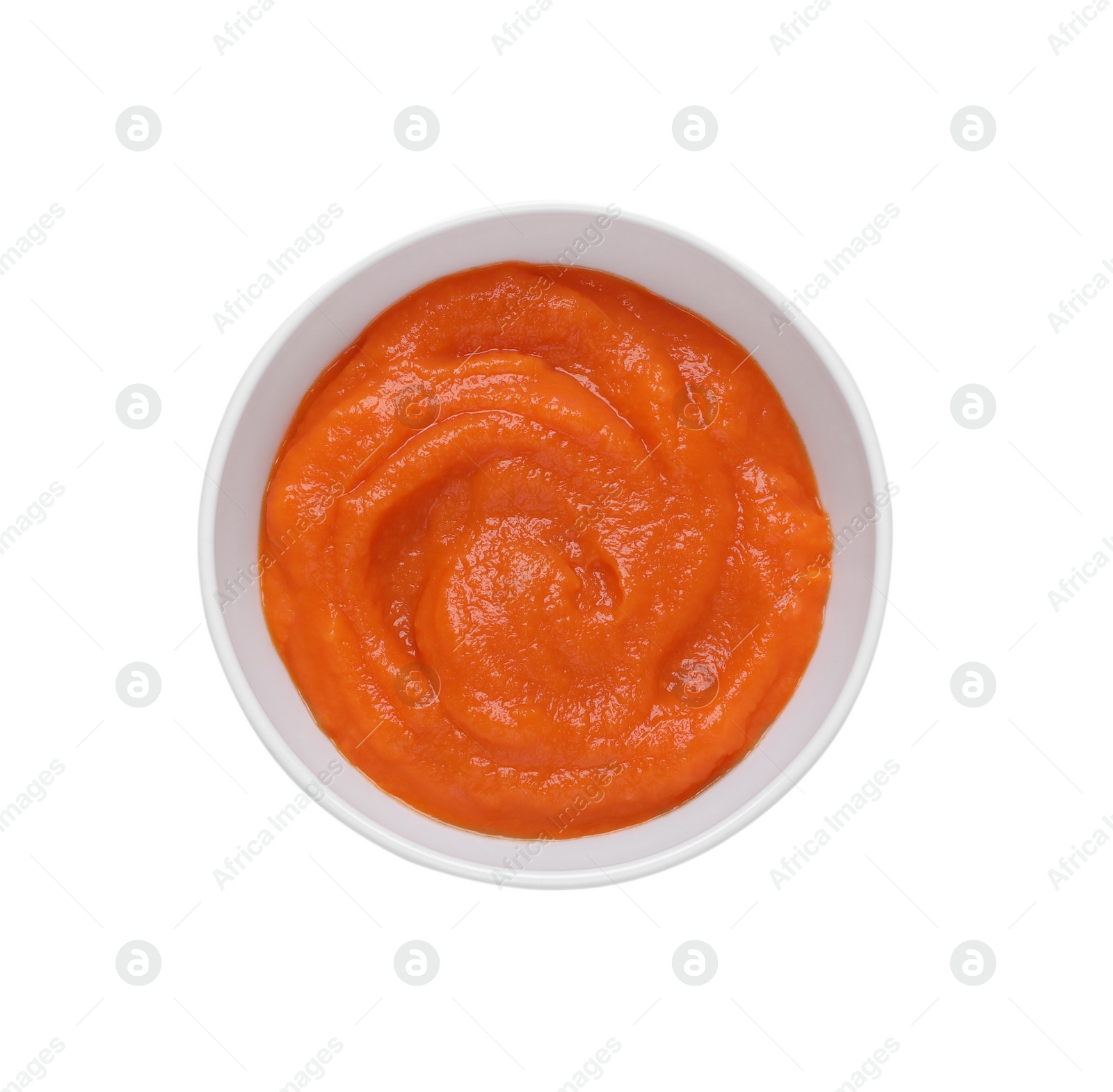 Photo of Bowl with healthy baby food isolated on white, top view