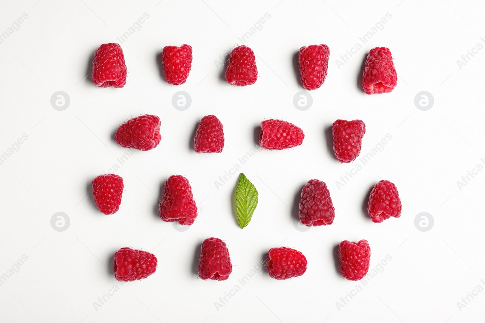 Photo of Composition with delicious ripe raspberries on white background, top view