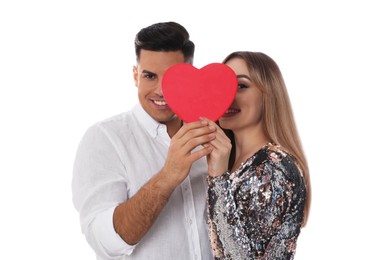 Photo of Lovely couple with decorative heart on white background. Valentine's day celebration