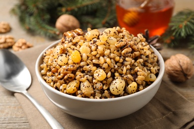 Traditional Christmas slavic dish kutia served on wooden table, closeup