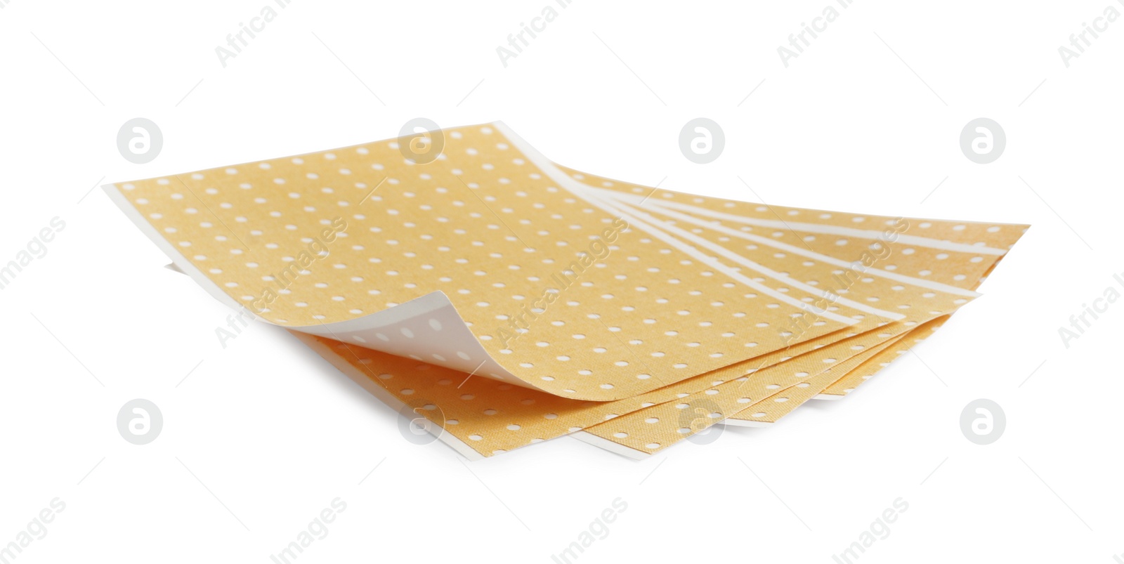 Photo of Pepper plasters isolated on white. Alternative medicine