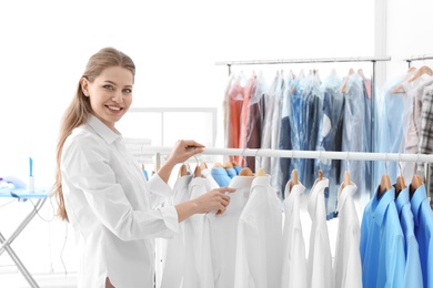 Employee working at dry-cleaner's