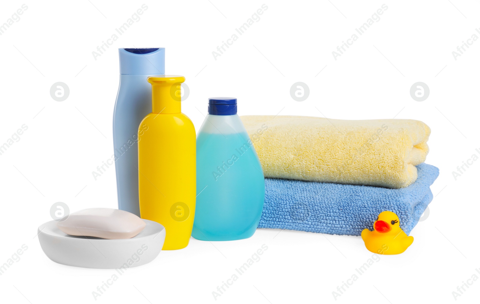 Photo of Baby cosmetic products, bath duck and towels isolated on white