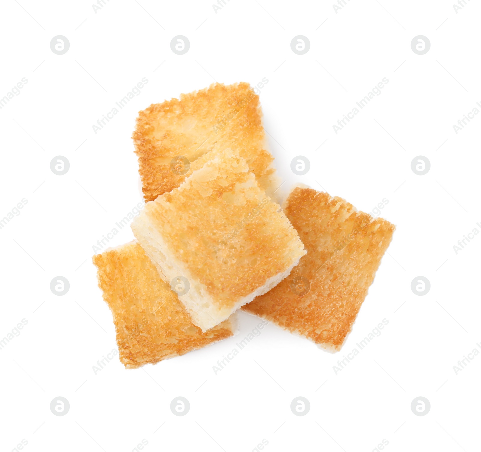 Photo of Delicious crispy croutons on white background, top view