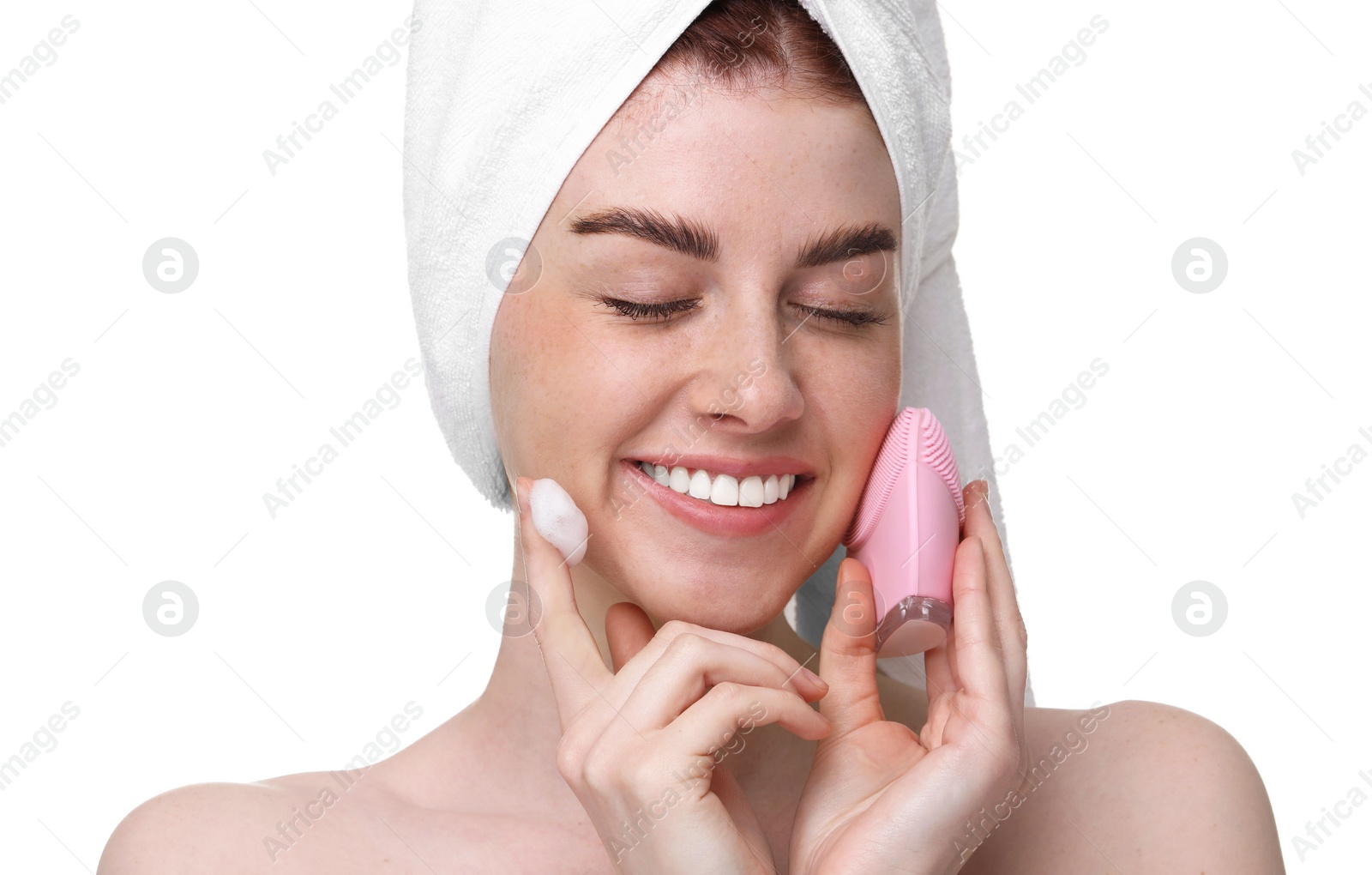 Photo of Washing face. Young woman with brush and cleansing foam on white background