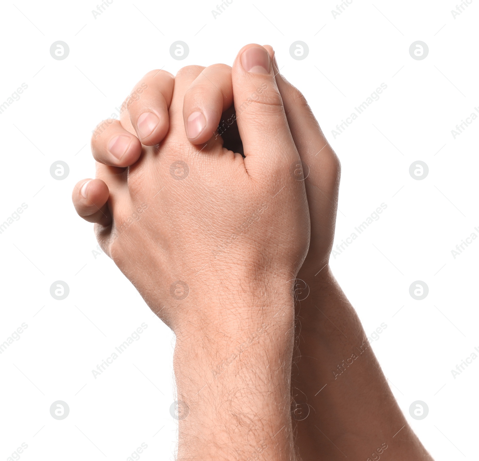 Photo of Religion. Christian man praying on white background, closeup