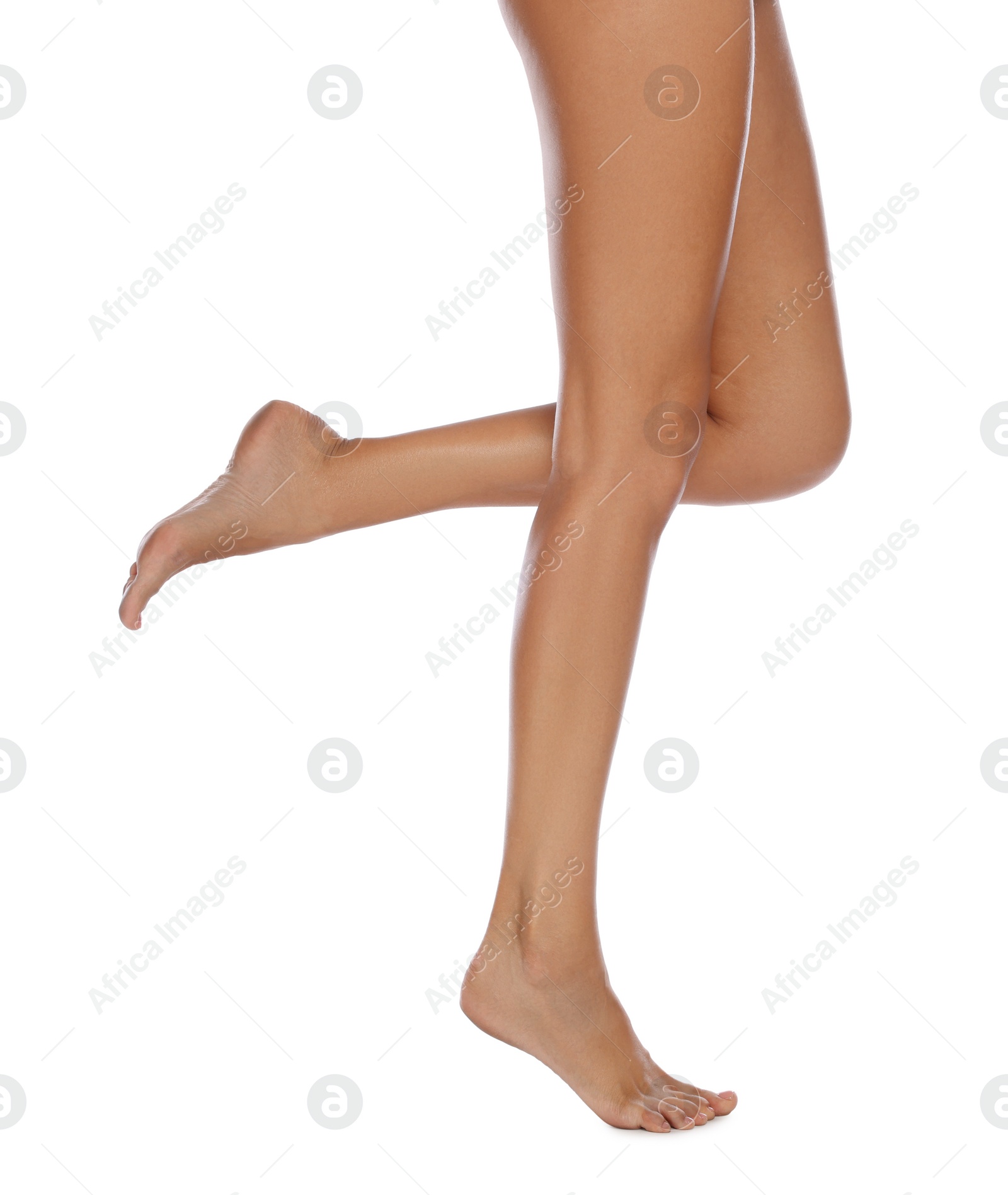 Photo of Woman with beautiful long legs on white background, closeup