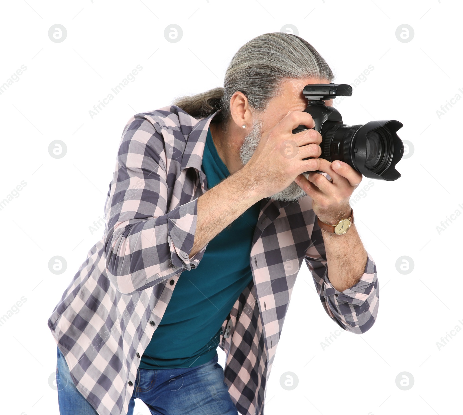 Photo of Male photographer with professional camera on white background