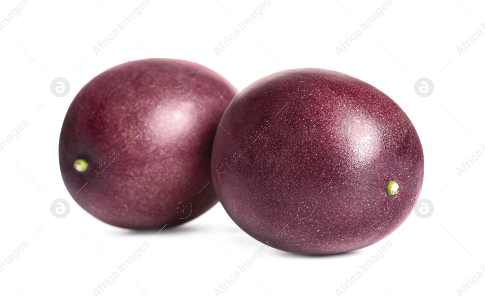 Photo of Delicious ripe passion fruits on white background