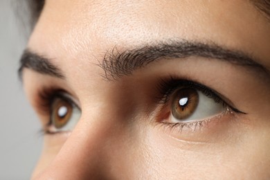 Photo of Beautiful woman with hazel eyes, closeup view