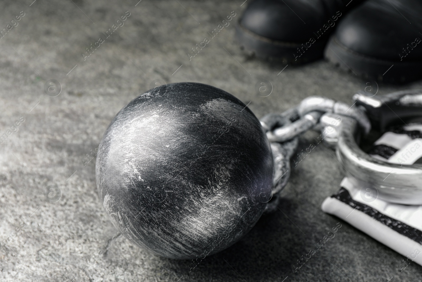 Photo of Prisoner ball with chain on grey table