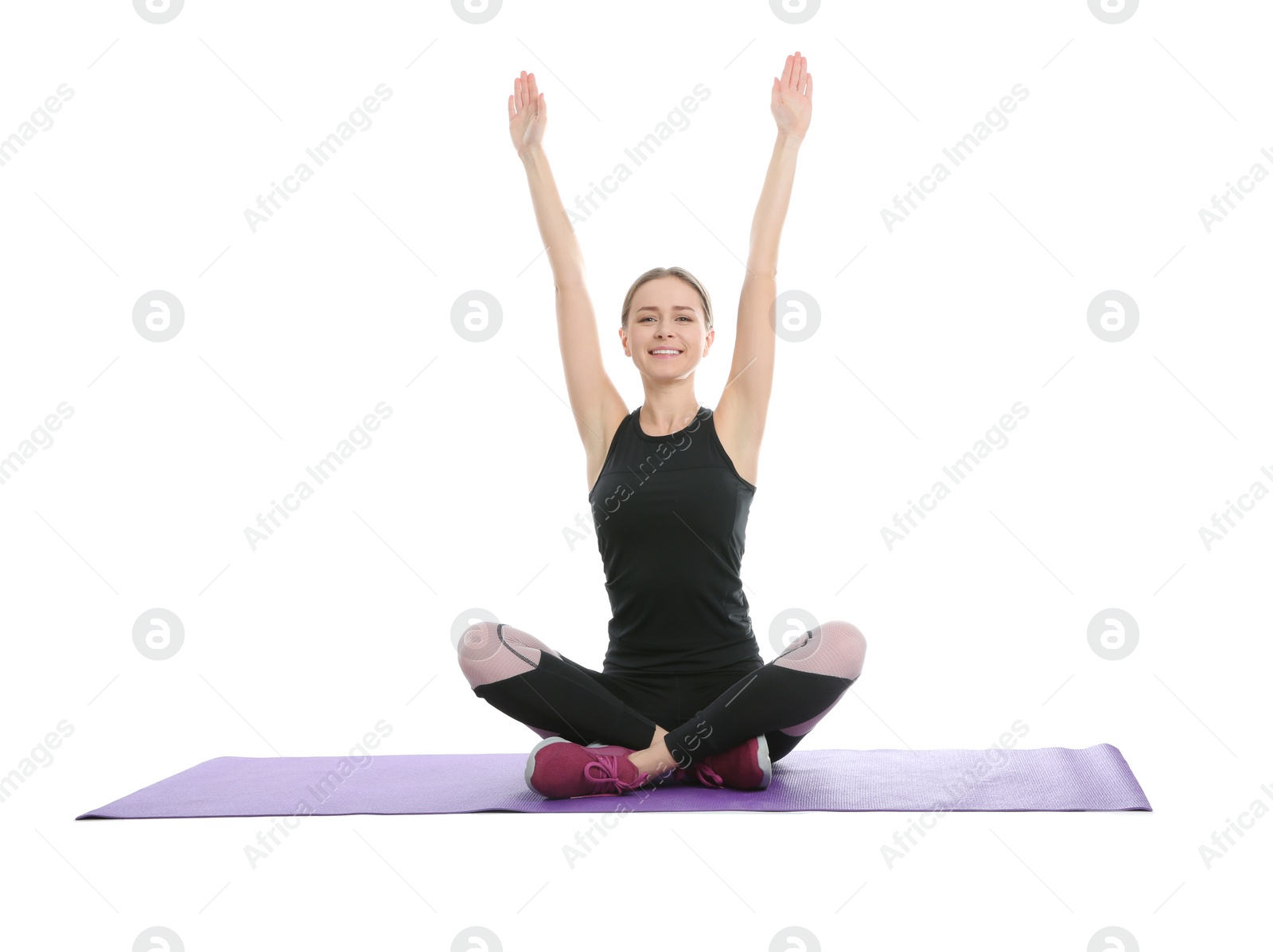 Photo of Young woman doing sports exercises isolated on white. Home fitness
