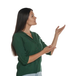 Photo of Beautiful young woman gesturing on white background. Weather forecast reporter