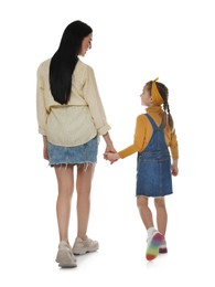 Photo of Little girl with her mother on white background